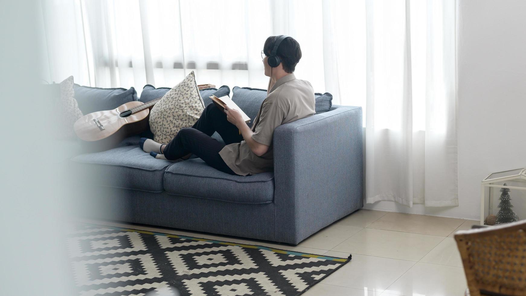A musician is writing song in home Studio photo