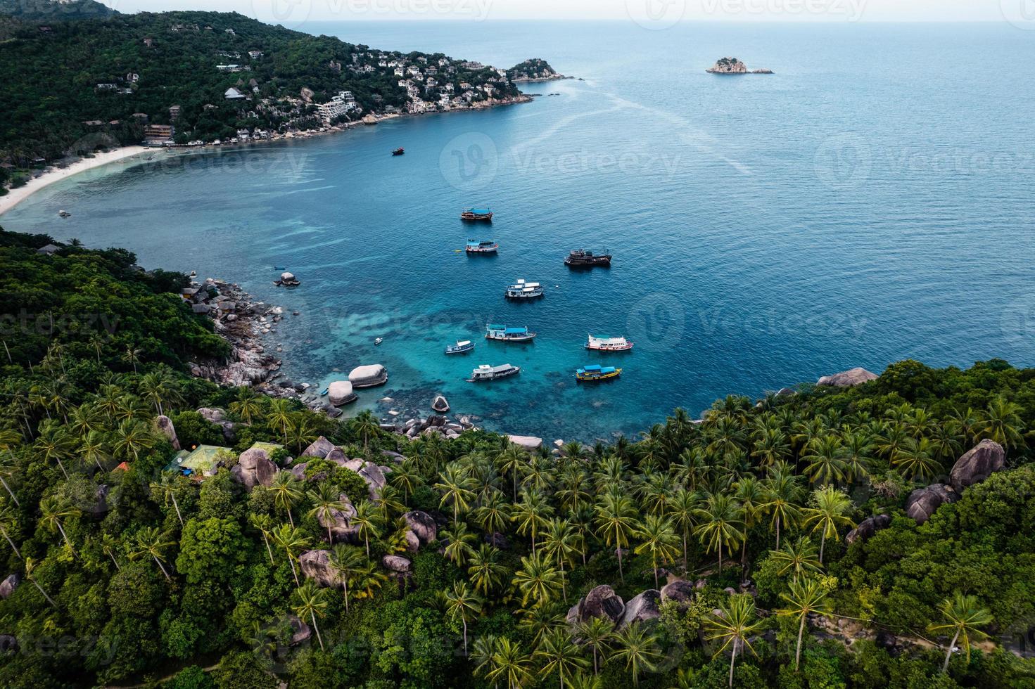 Bay and boats form above in island photo