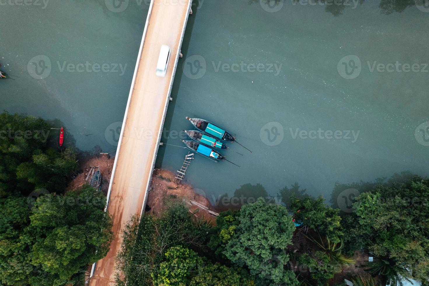 High angle mangrove forest and canal water photo