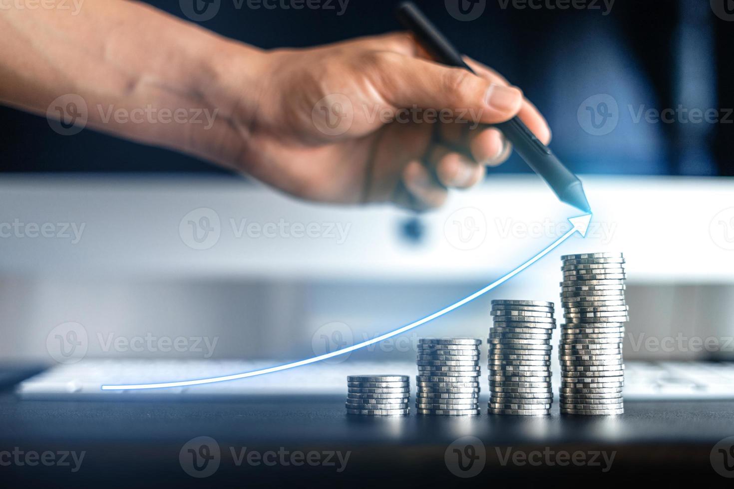 money growth,silver coins stacked up photo