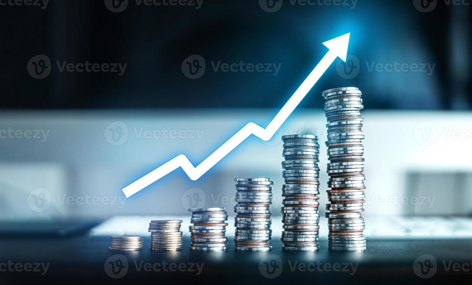 money growth,silver coins stacked up photo