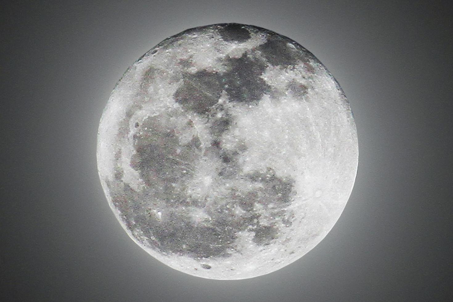 Power Light of Full super moon in dark black night and Show texture space of Lunar Surface. photo