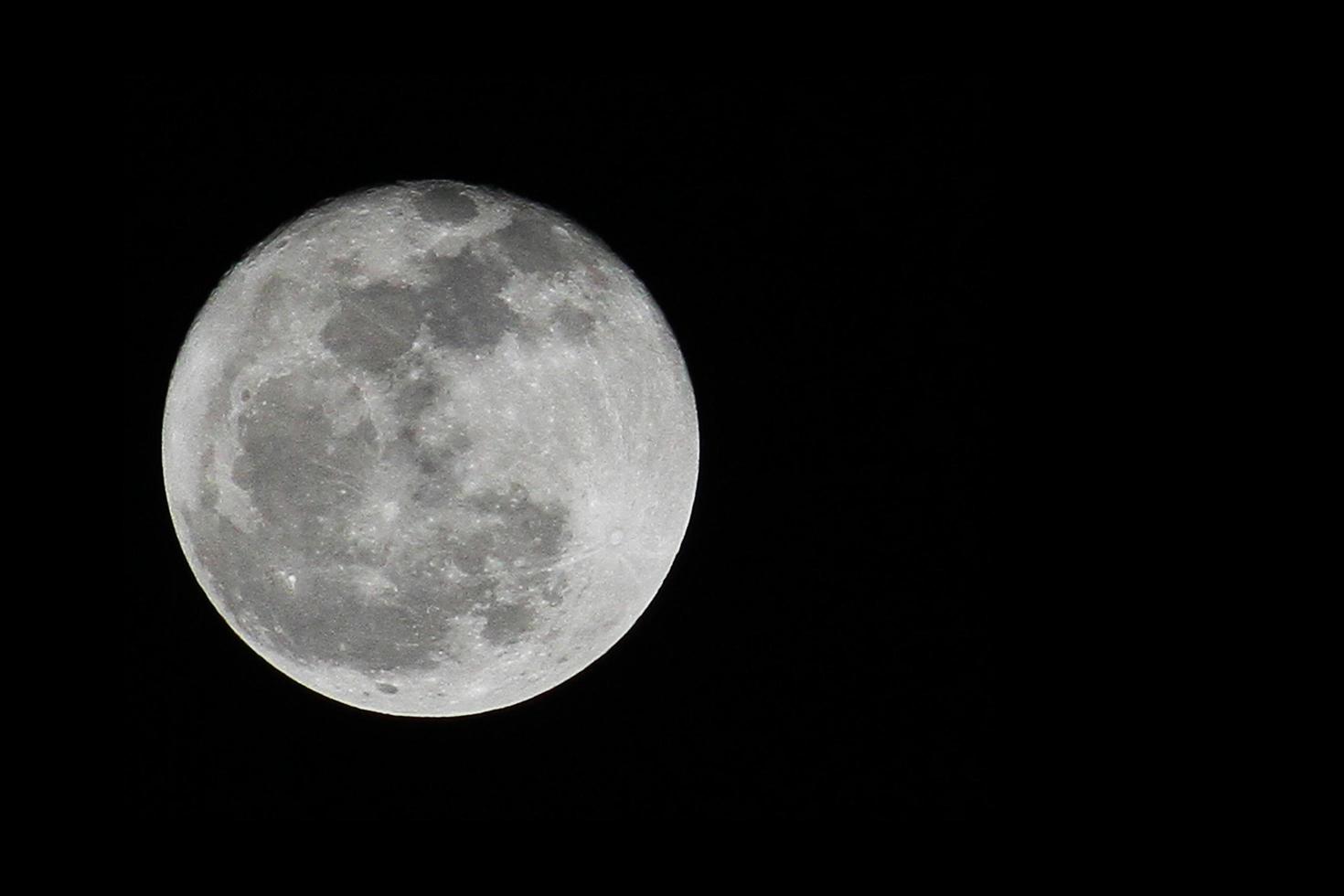 Power Light of Full super moon in dark black night and Show texture space of Lunar Surface. photo