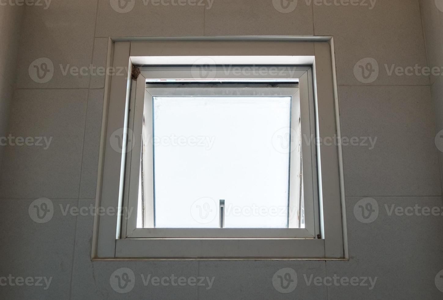 Metal awning window is opening. photo