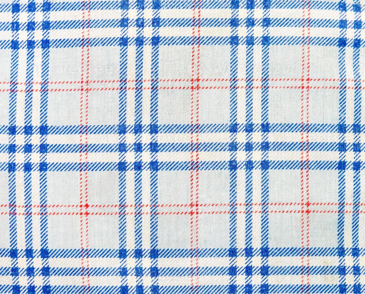 Clean table cloth with blue strip. photo