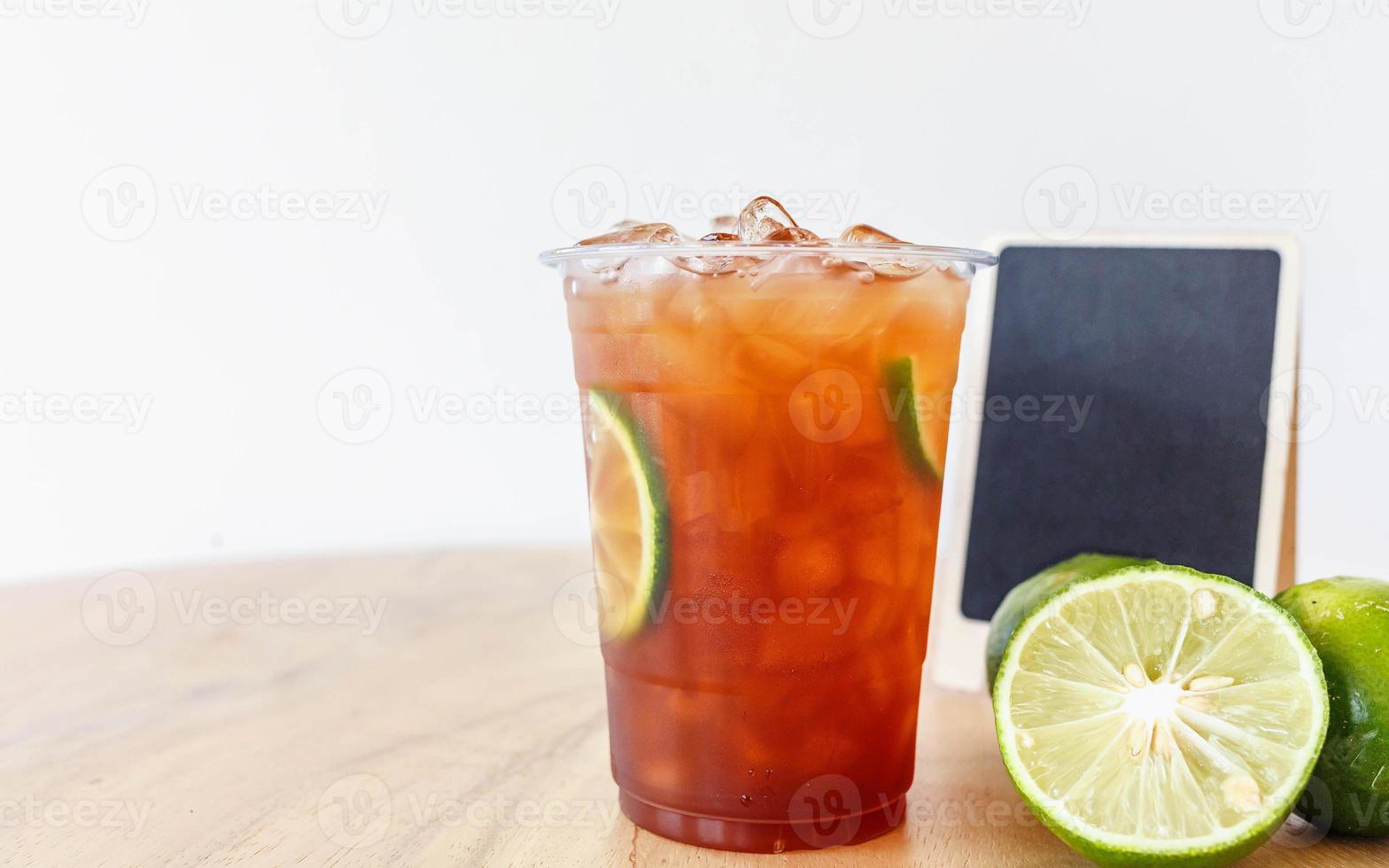 Ice lemon tea  on wooden table photo