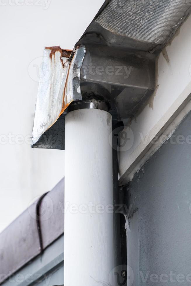Old gutter with the rust. photo