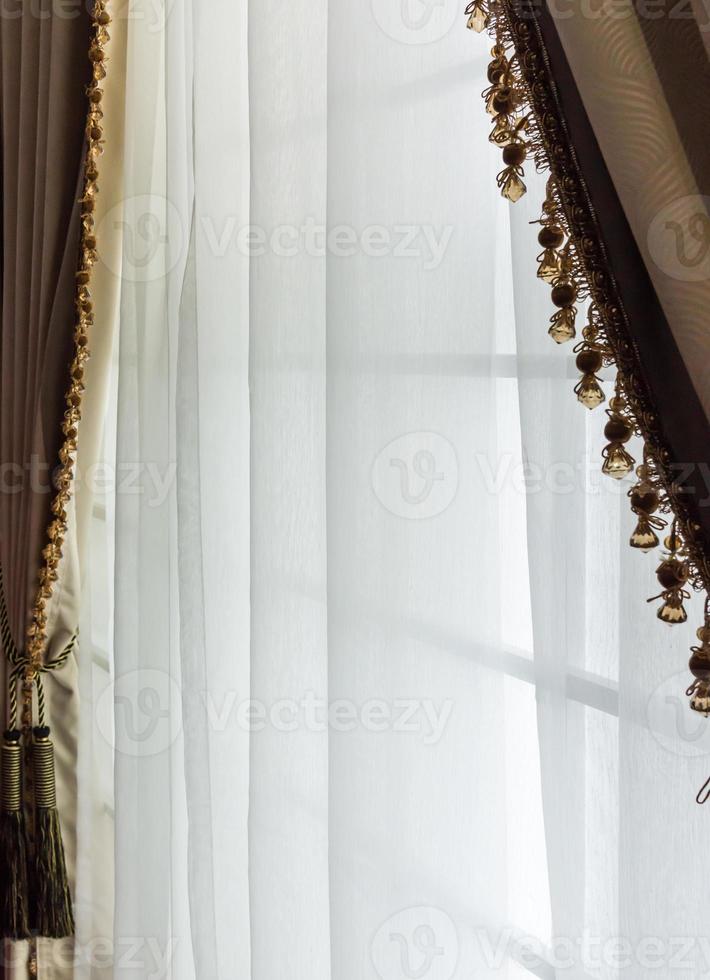 Brown curtain with translucent fabric photo