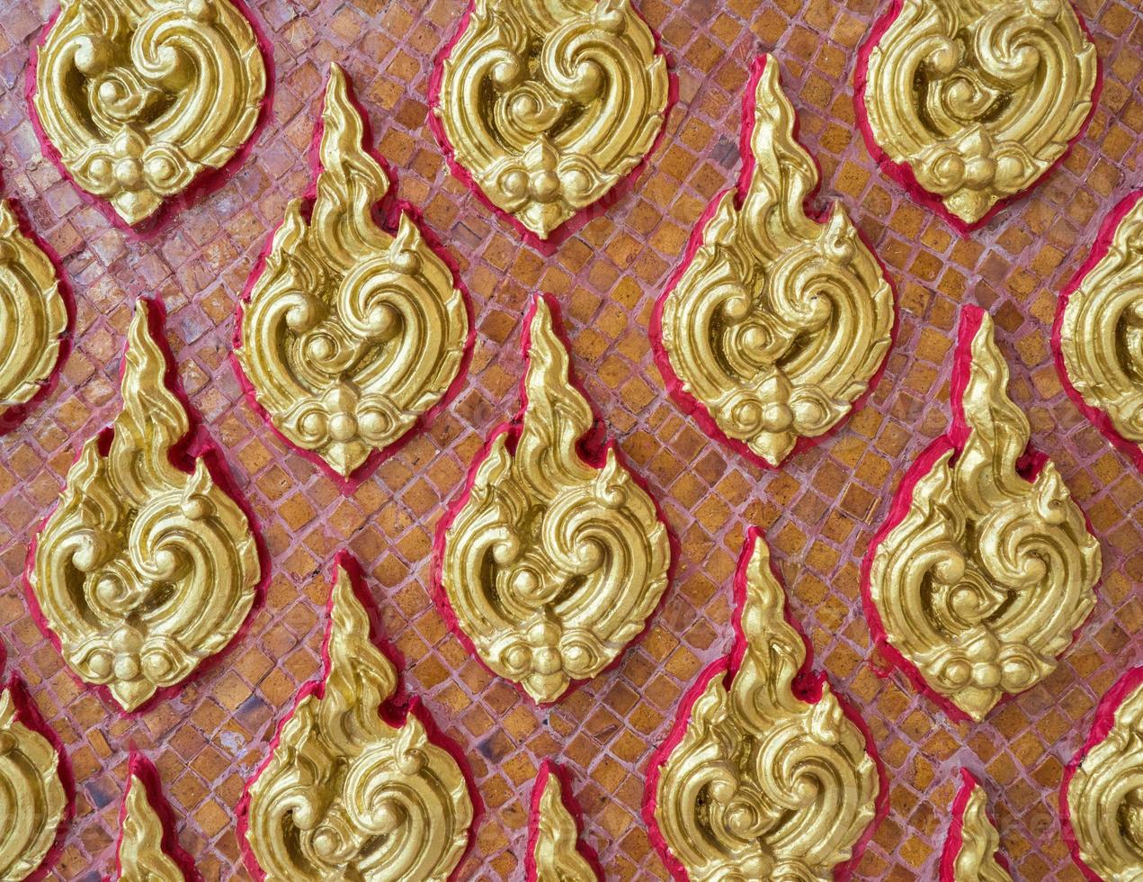 Golden floral pattern in the traditional Thai style. photo