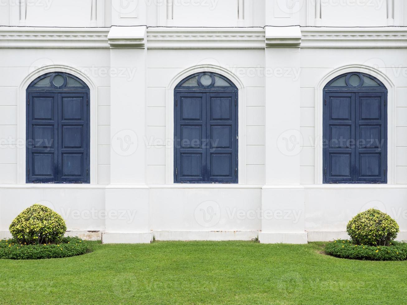 European style building with the blue window. photo