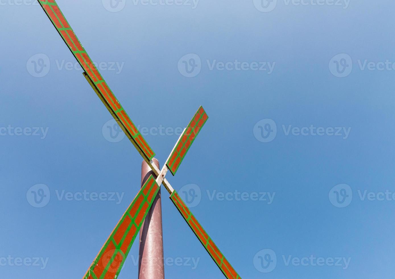 Small  wooden windmill. photo