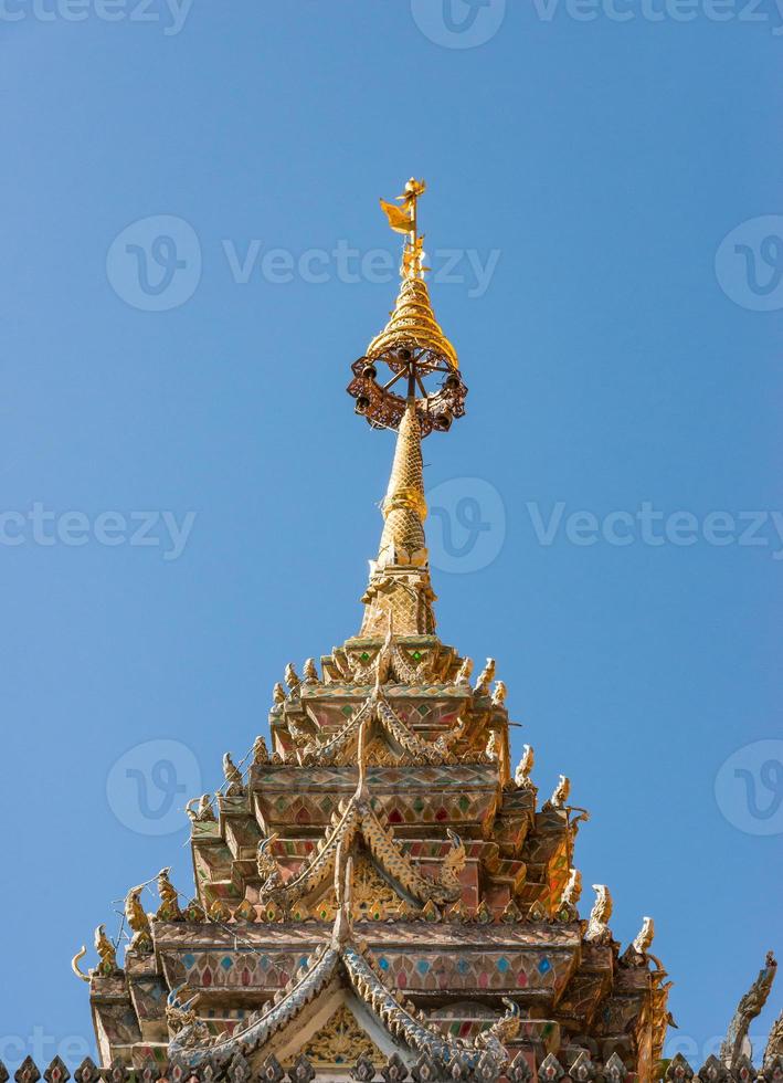 Golden pinnacle of the old pagoda photo