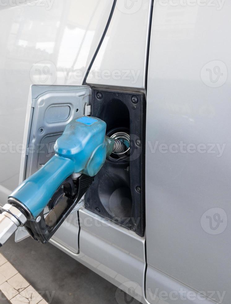 Refueling the gasoline in the local gas station. photo