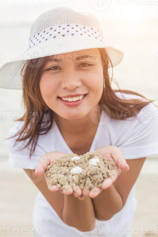 Woman walking on the beach. photo