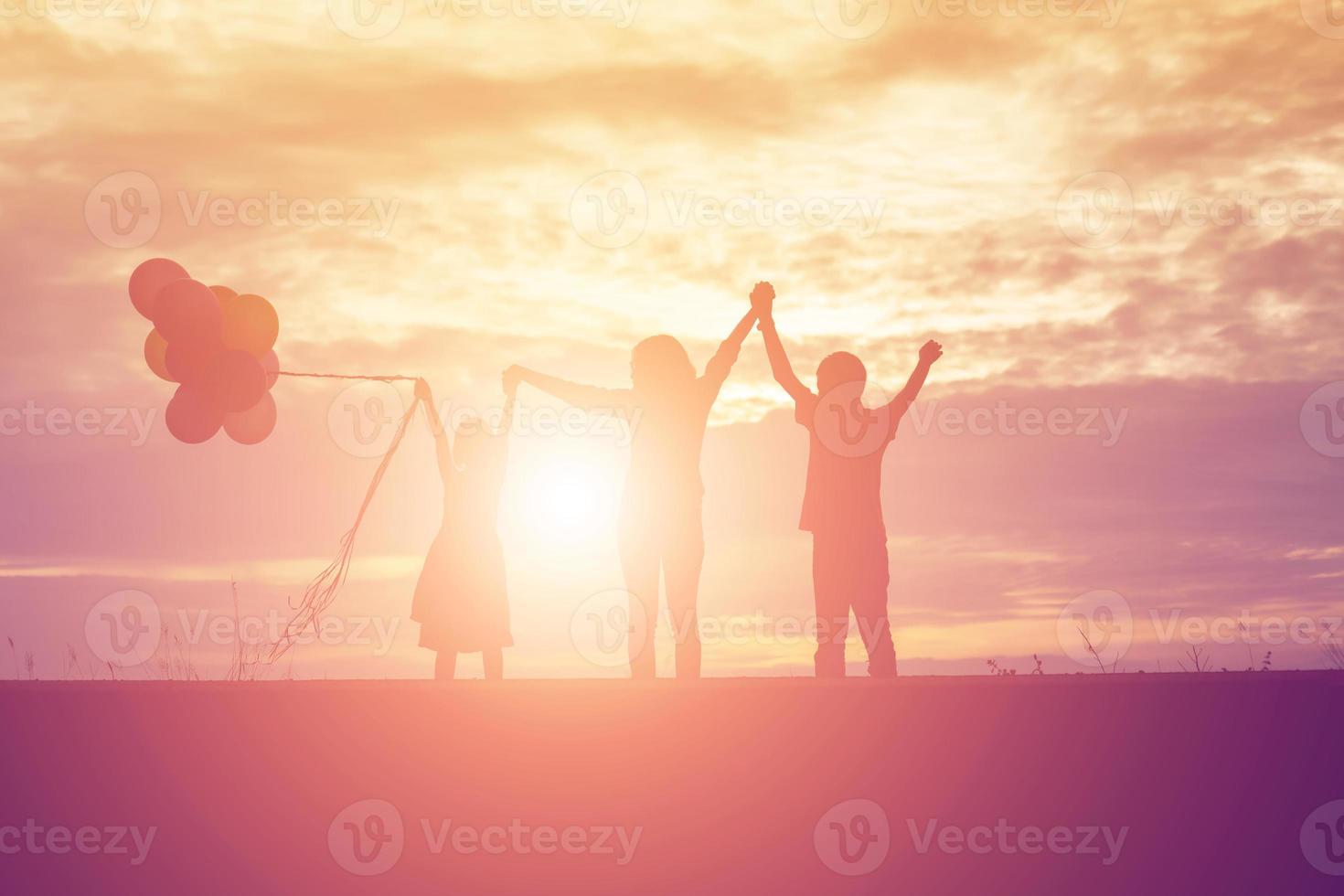 kid silhouette,Moments of the child's joy. On the Nature sunset photo