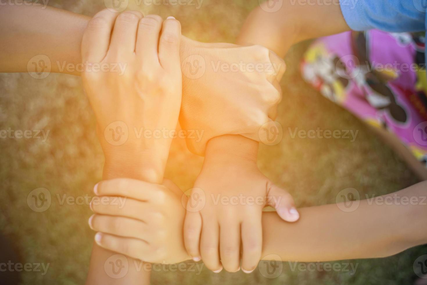 Happy boy child is smiling enjoying adopted life. Portrait of young boy in nature, park or outdoors. Concept of happy family or successful adoption or parenting. photo