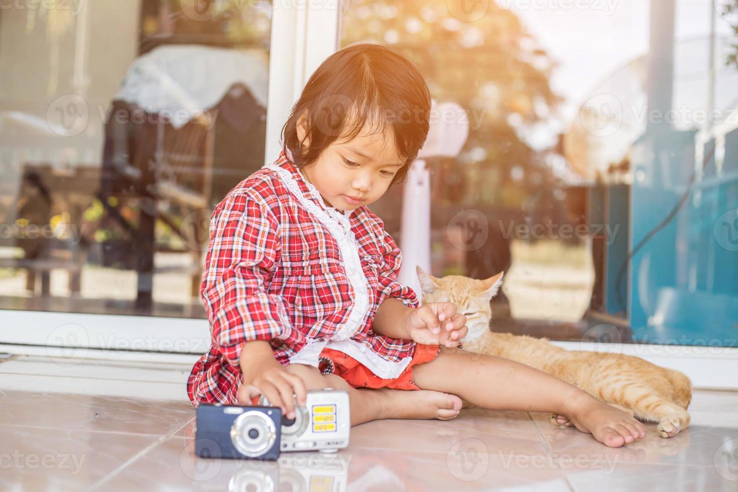 little girl photographs flower outdoor photo