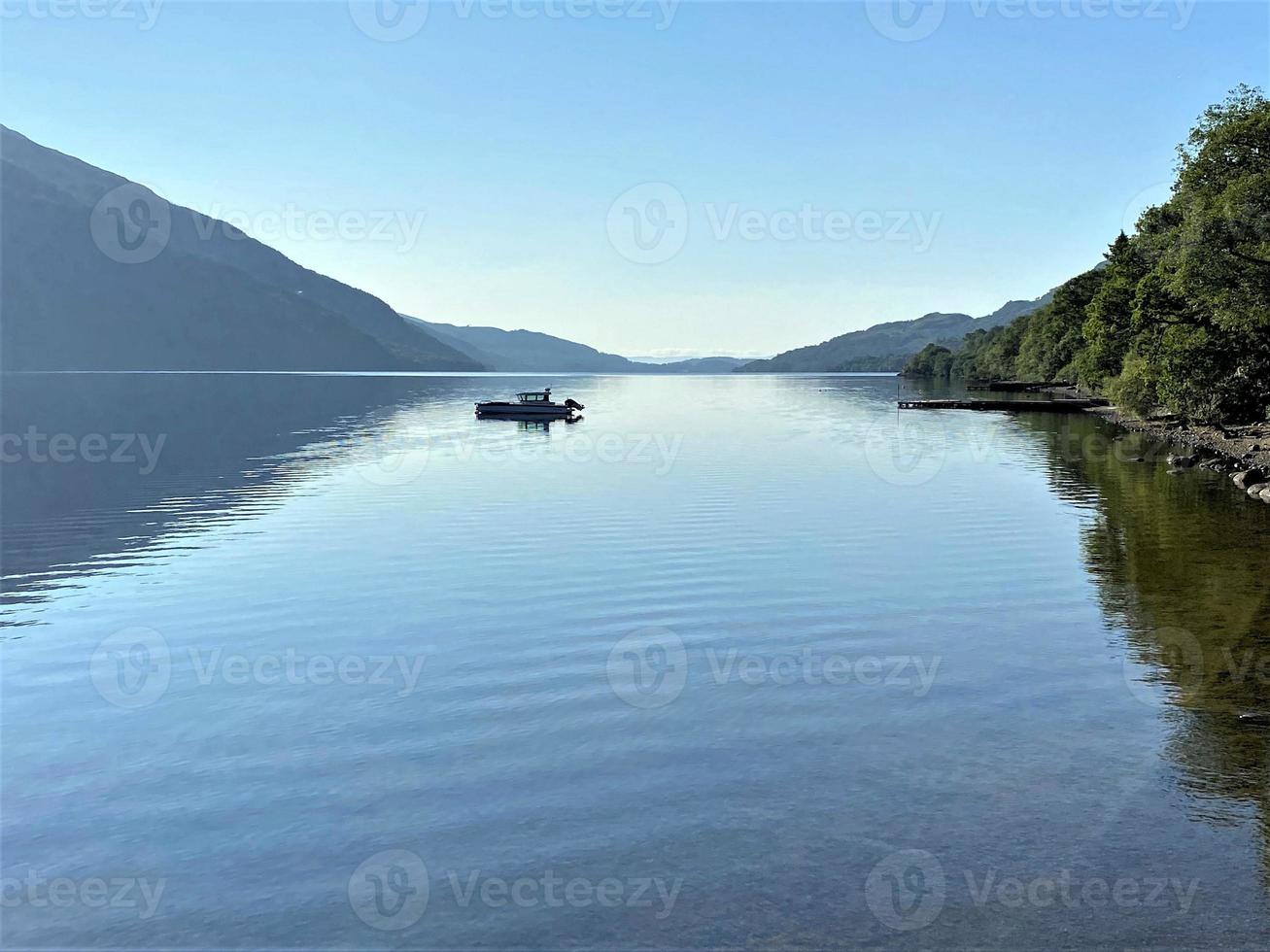 A view of Loch Lomond in Scotland in the morning sunshine photo