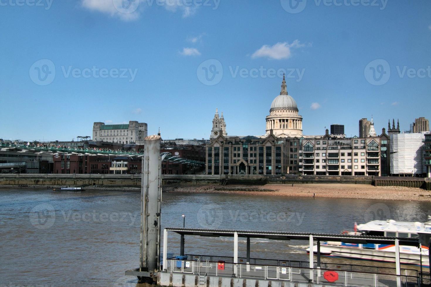 A view of St Pauls Cathedral across the river Thames photo