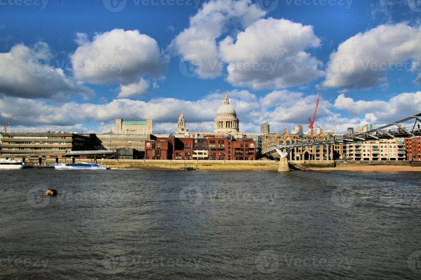 A view of St Pauls Cathedral across the river Thames photo