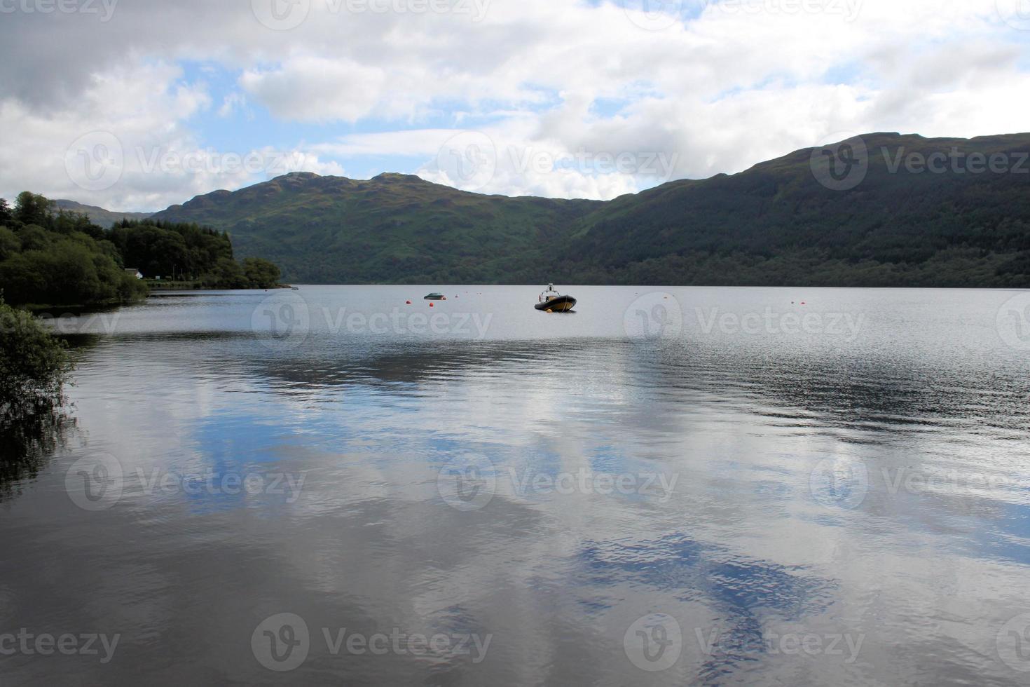A view of Loch Lomond in Scotland in the morning sunshine photo