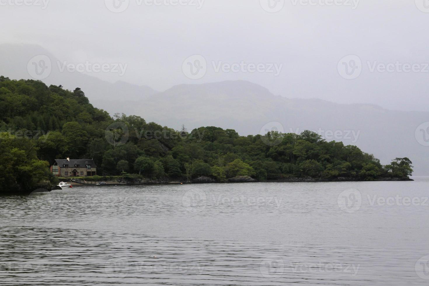 A view of Loch Lomond in Scotland in the morning sunshine photo