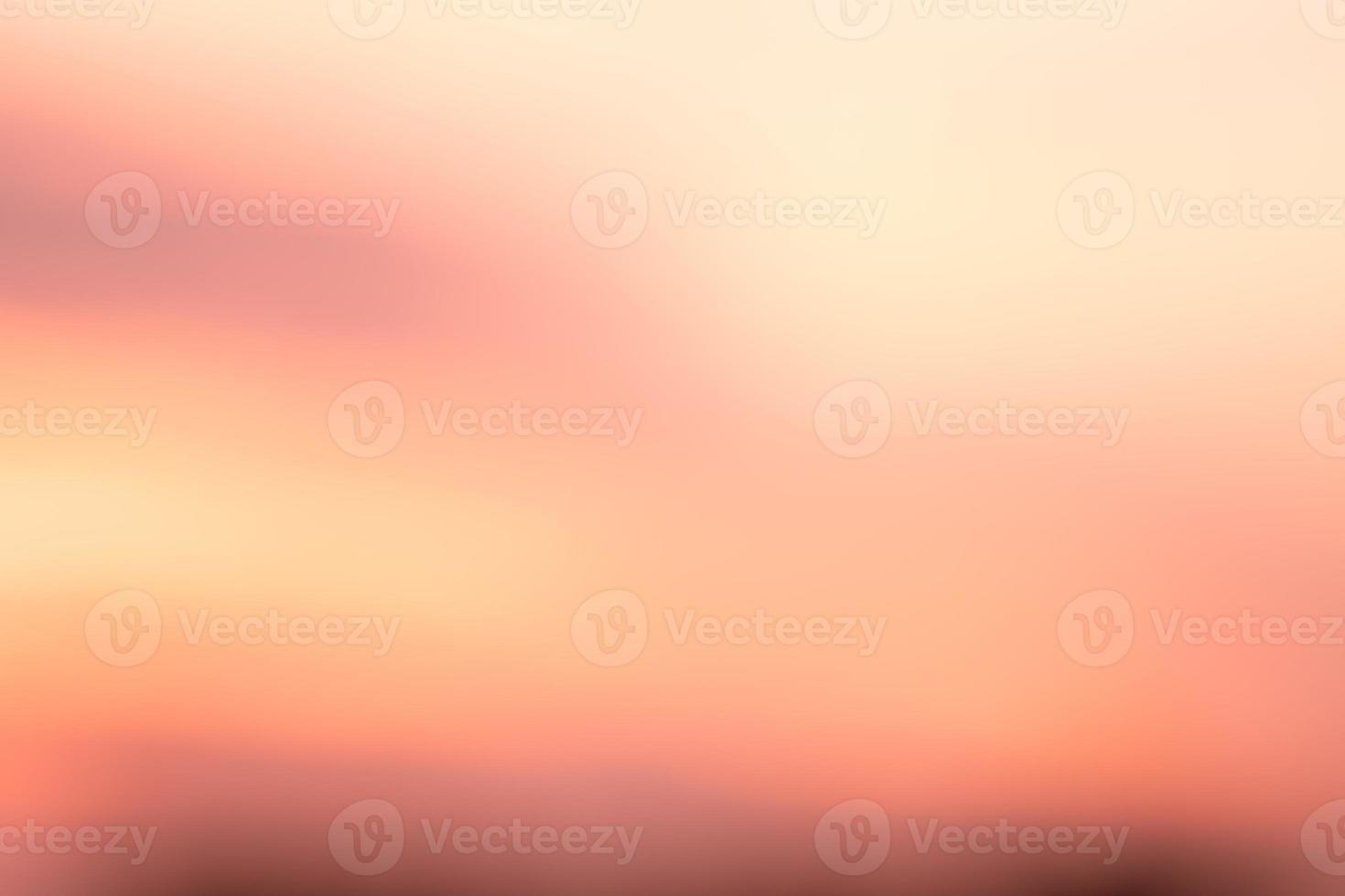 orange smooth gradient blurred background has a little abstract light. soft background for wallpaper,design,graphic and presentation photo