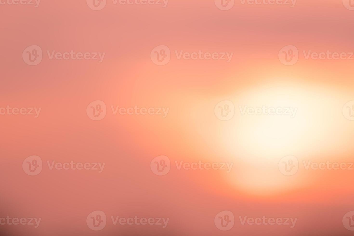 orange smooth gradient blurred background has a little abstract light. soft background for wallpaper,design,graphic and presentation photo
