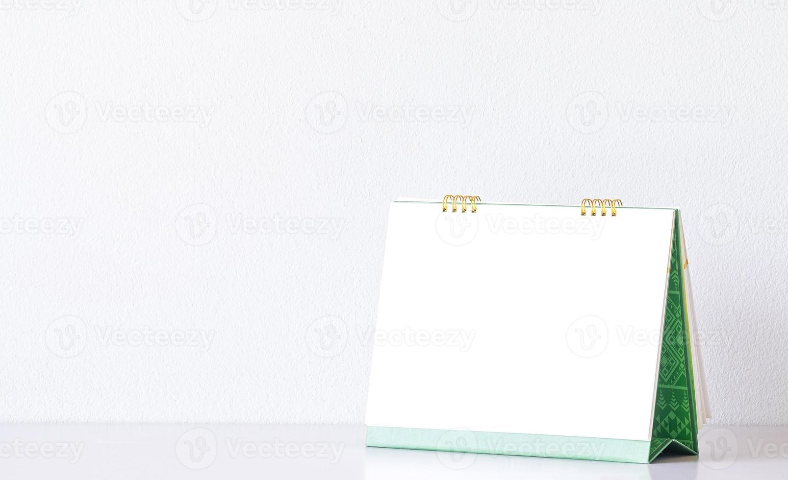 Stock cover Wall calendar mock up on a white wall background. High resolution. photo