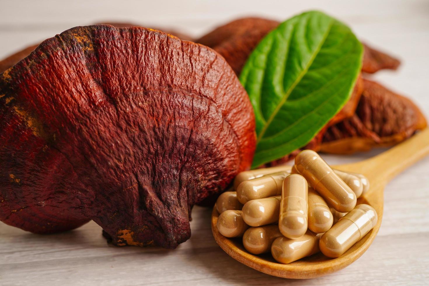 Alternative medicine herbal organic capsule with vitamin E omega 3 fish oil, mineral, drug with herbs leaf natural supplements for healthy good life. photo
