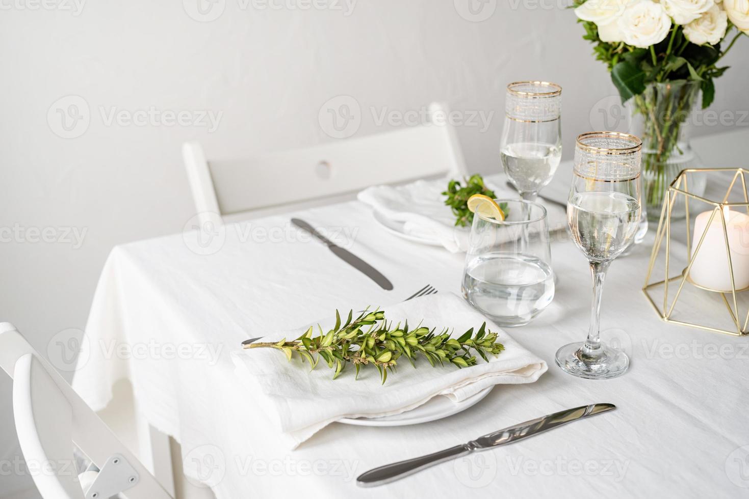 beautiful table setting for romantic dinner for two photo