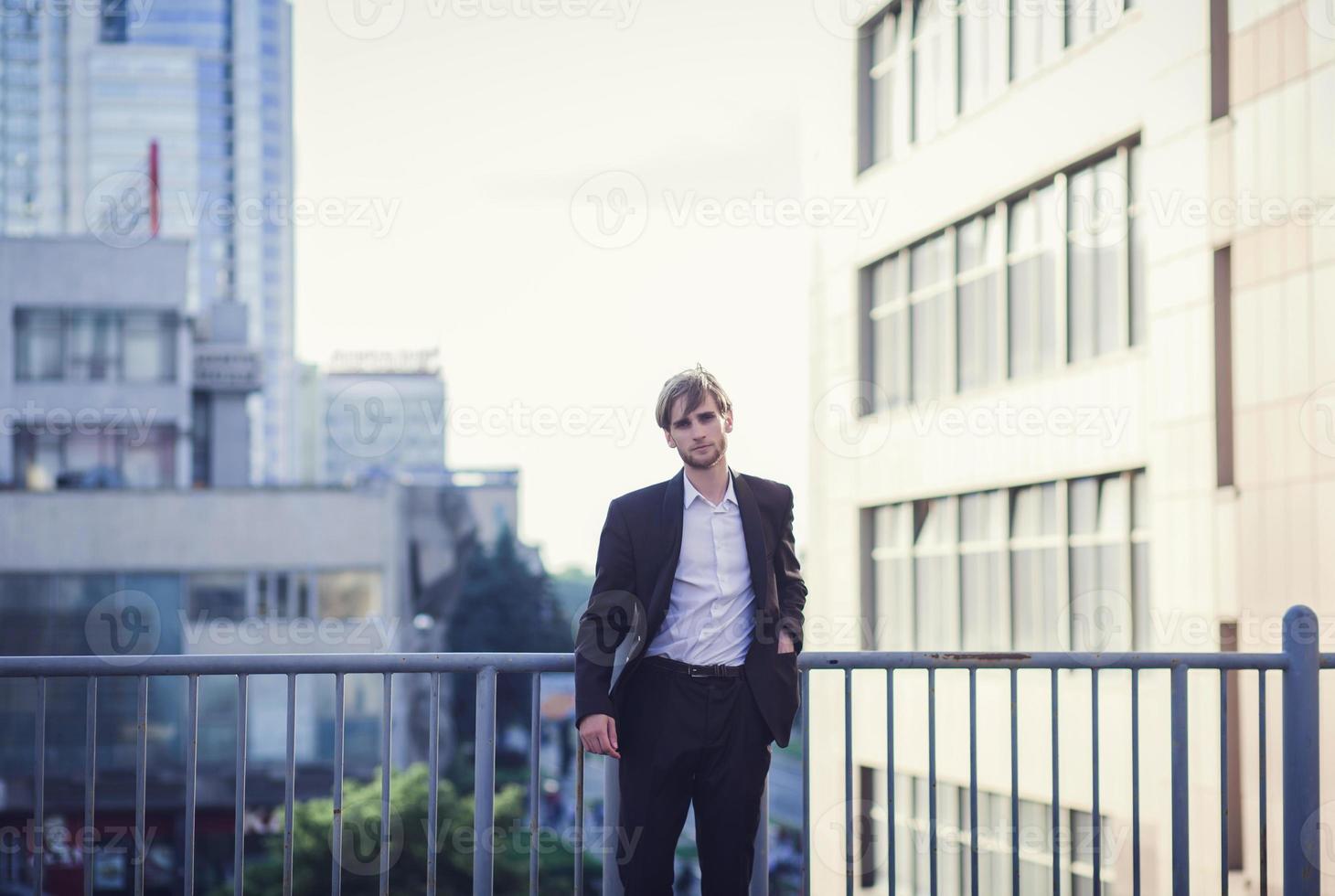 young businessman in a suit photo