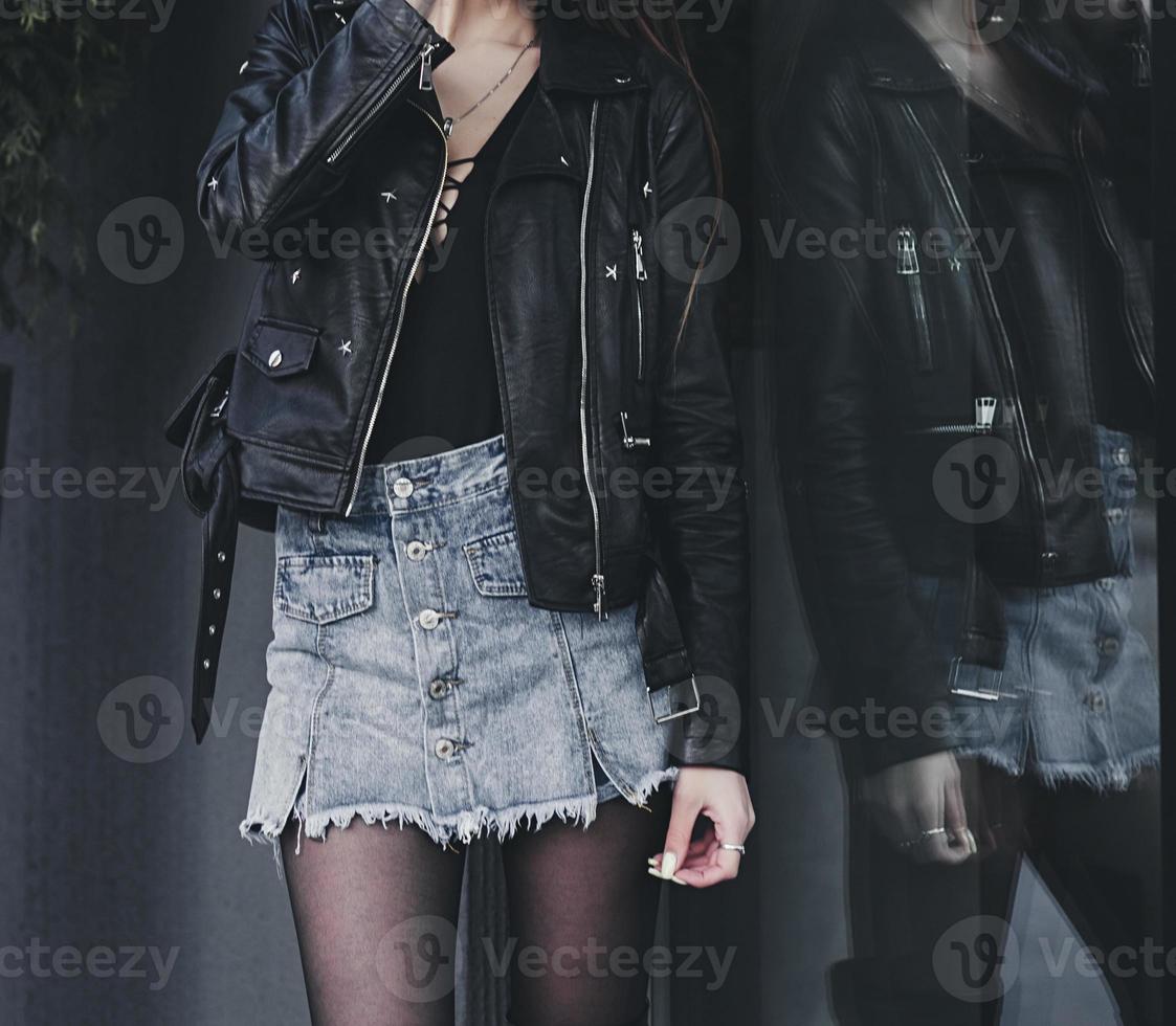 Woman wearing denim skirt photo