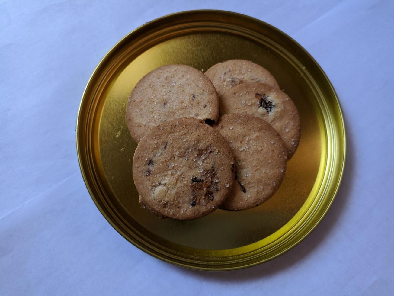 Raisin Biscuits on a golden plate photo