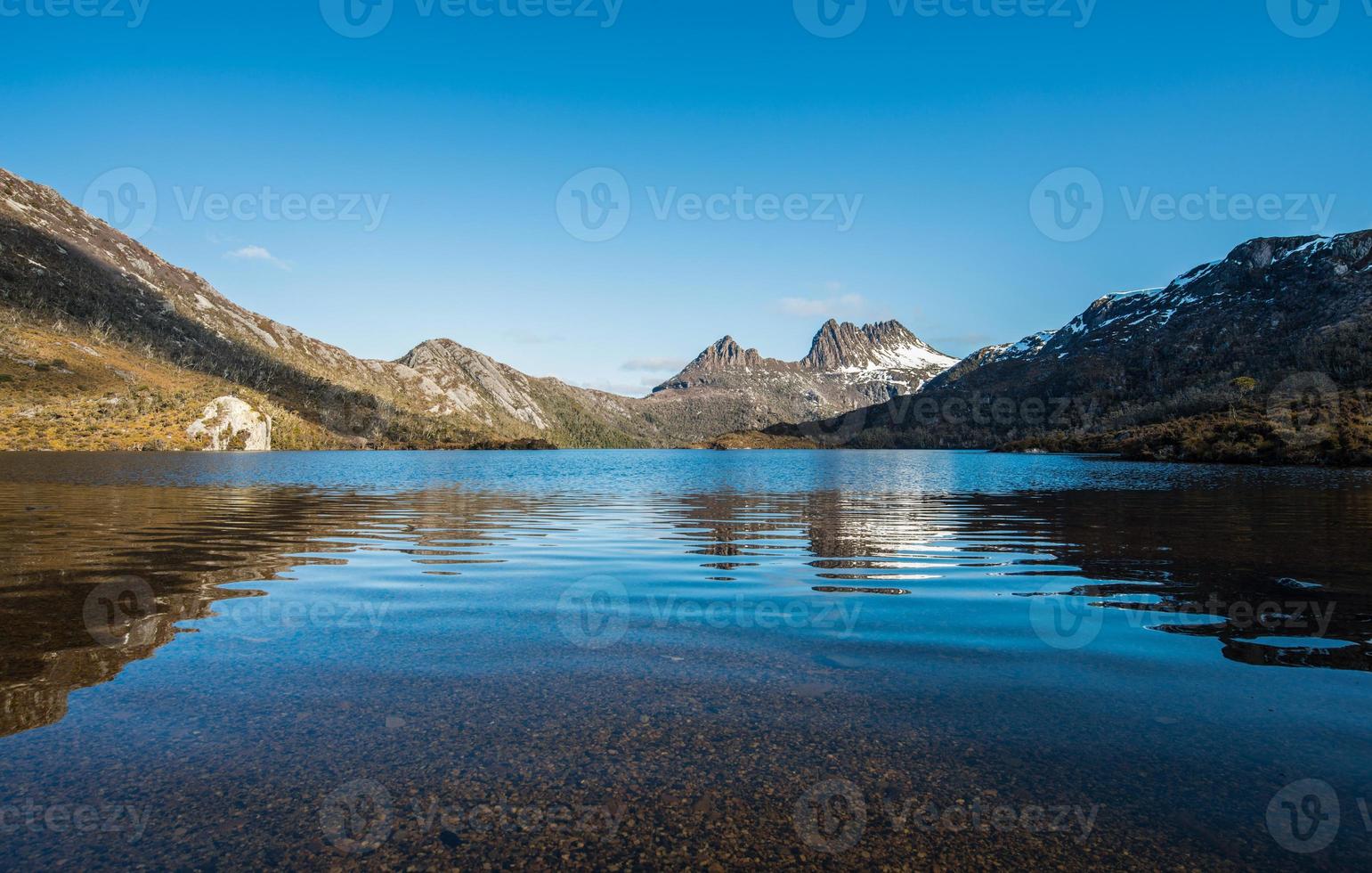 The spectacular view of Dove lake reflection with Cradle mountain the world heritage sites of Tasmania state of Australia. photo