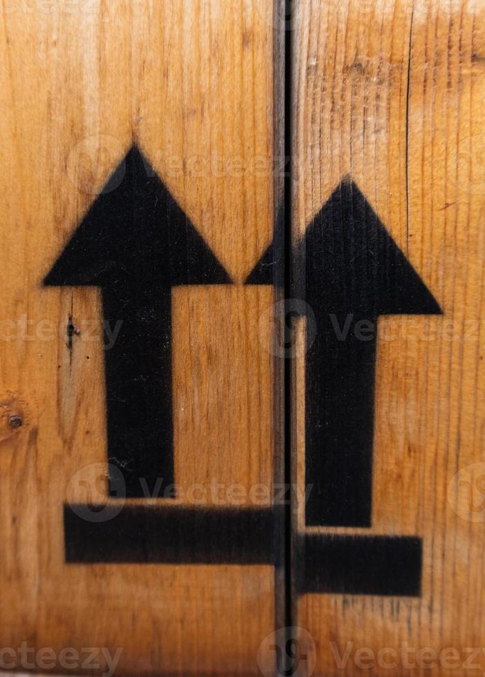This end up fragile sign with up arrows on a wood box photo