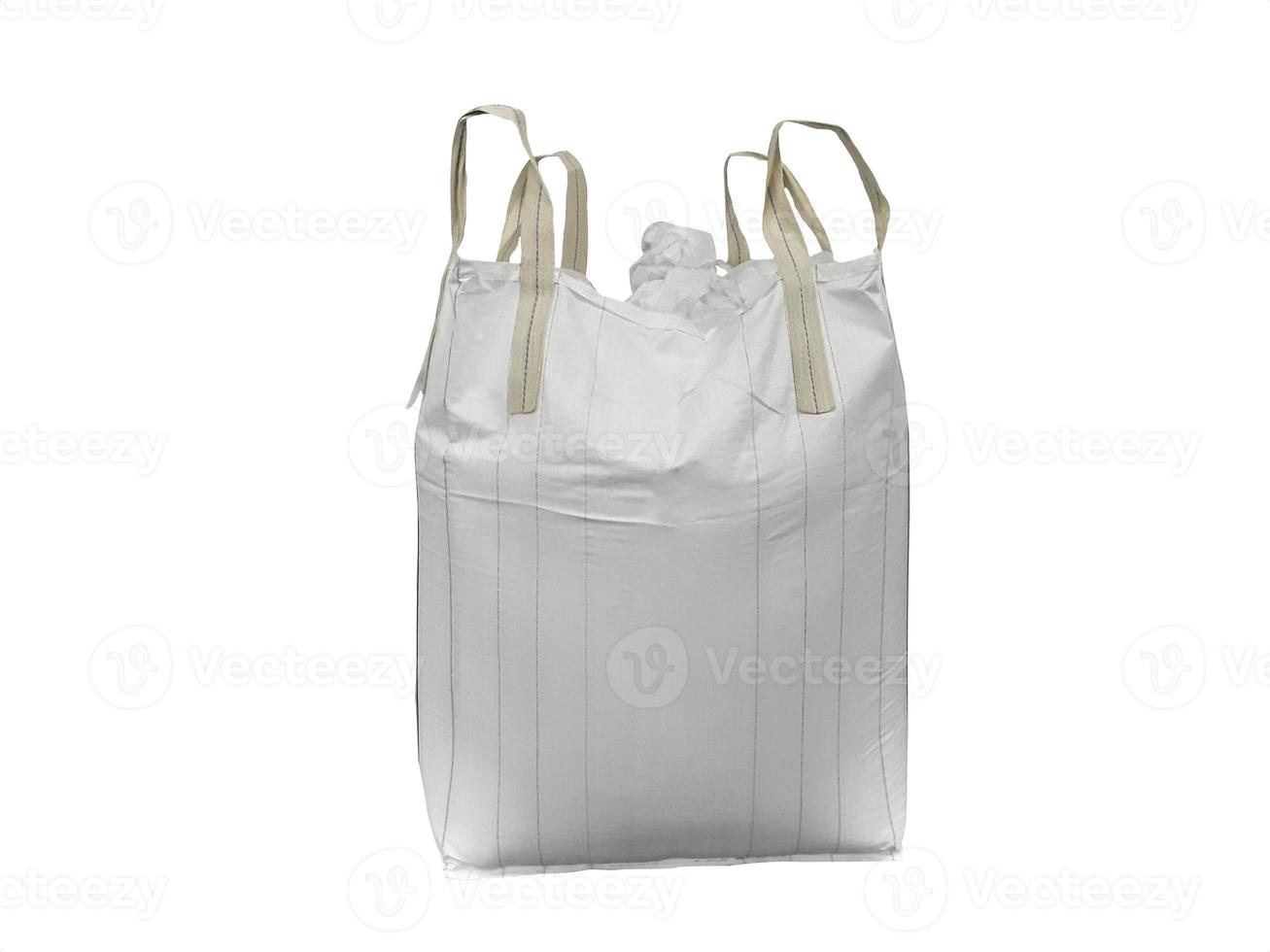 Chemical fertilizer pile Stock jumbo-bag on the White Background waiting for shipment. photo