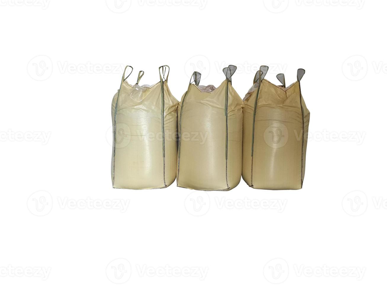 Chemical fertilizer pile Stock jumbo-bag on the White Background waiting for shipment. photo