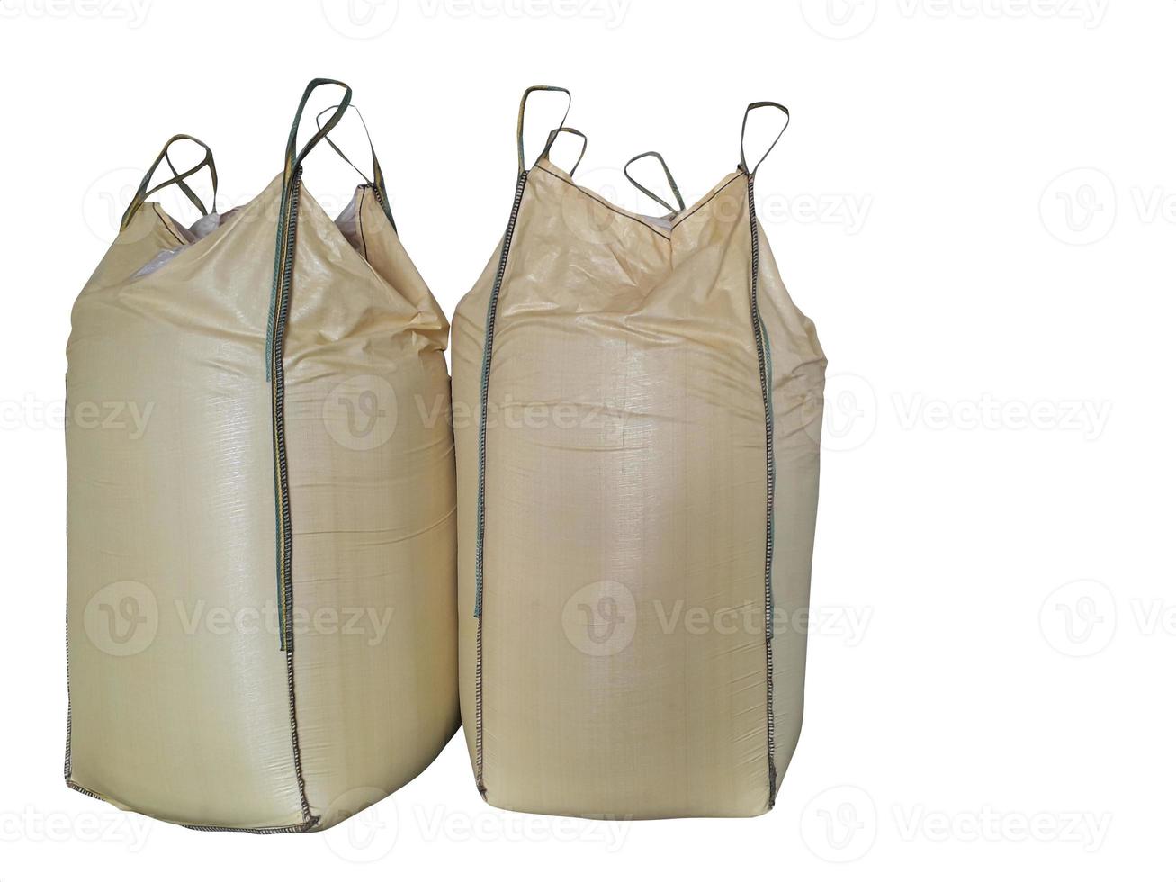 Chemical fertilizer pile Stock jumbo-bag on the White Background waiting for shipment. photo