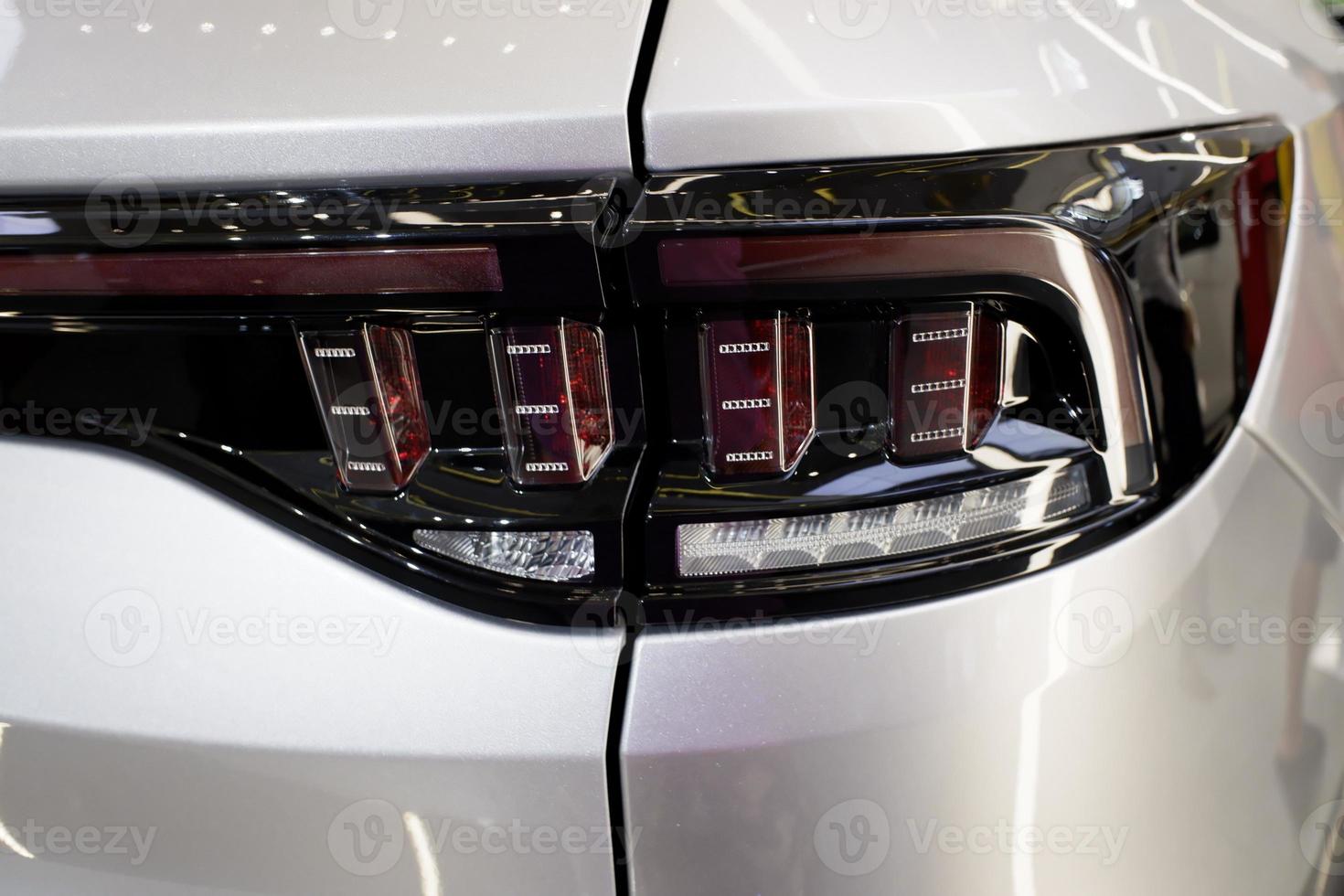 Macro view of modern lamp headlight. Luxury LED headlight background. photo