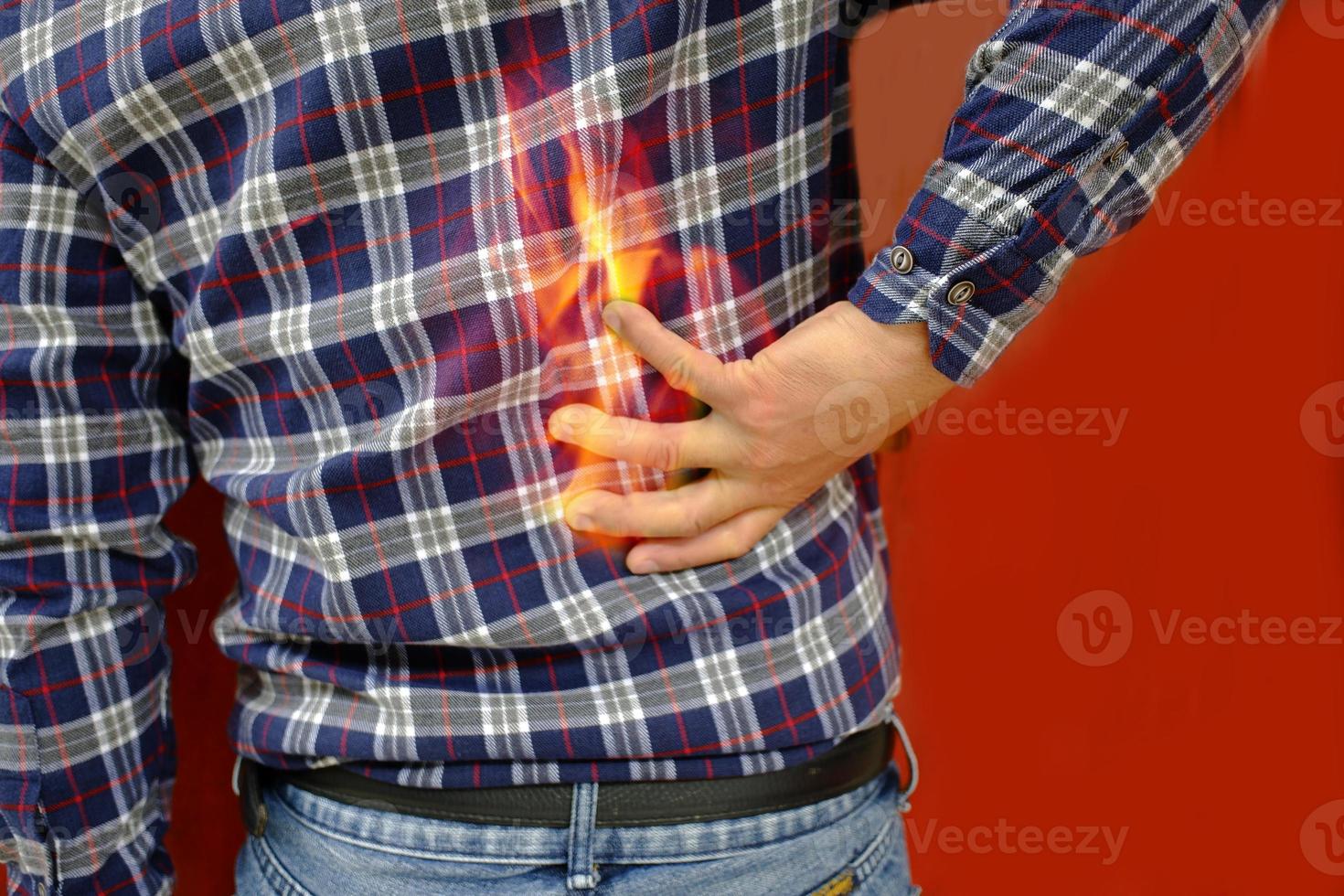 Kidneys pain. Man holding his back. Kidney Disease, Medical concept. photo