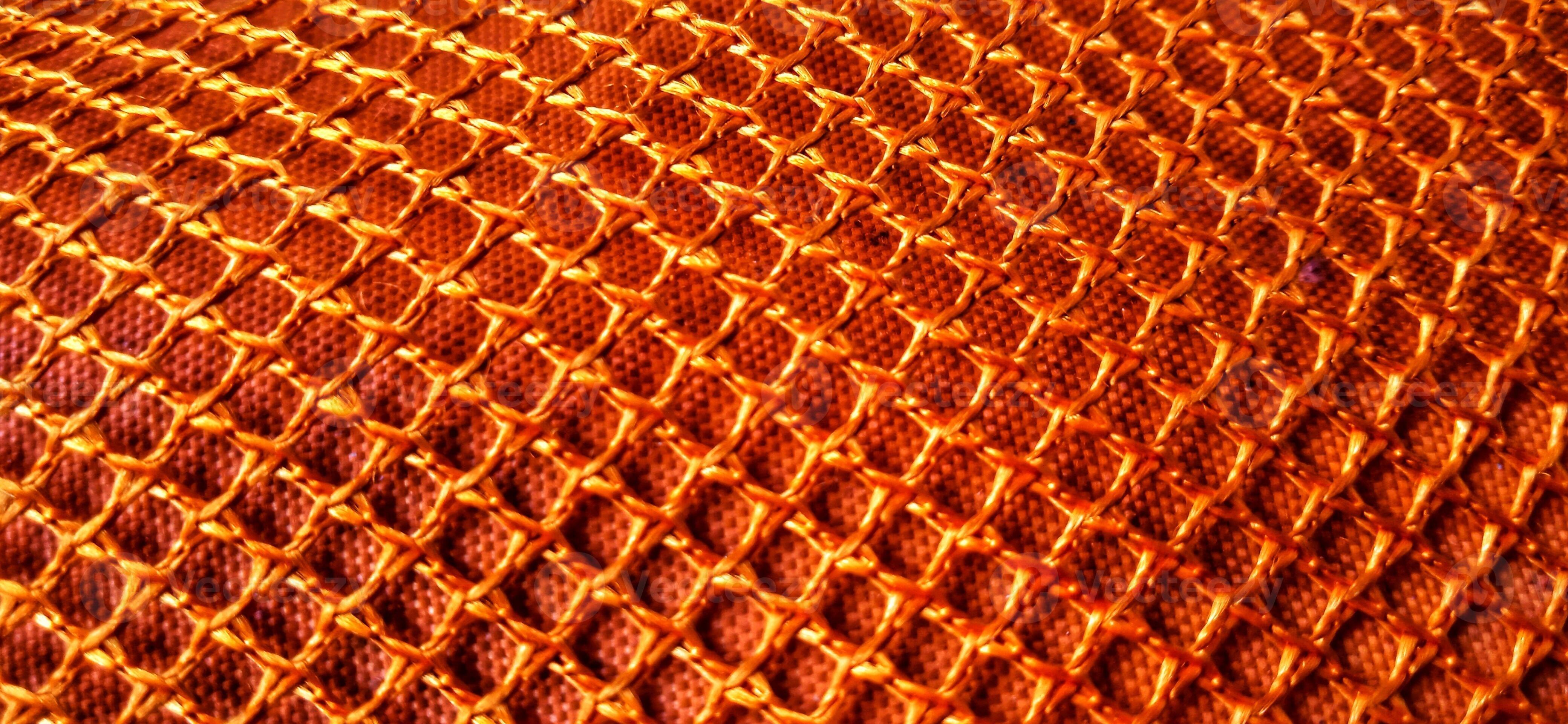 Gold orange net patterns backgrpund. Synthetic net