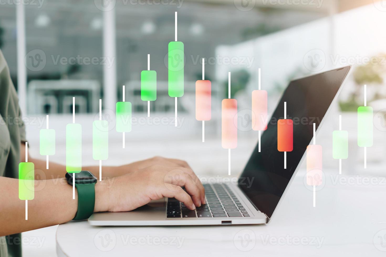 Fintech financial icon and market stock graph pop up in computer screen monitor with finger point. Financial business technology. photo