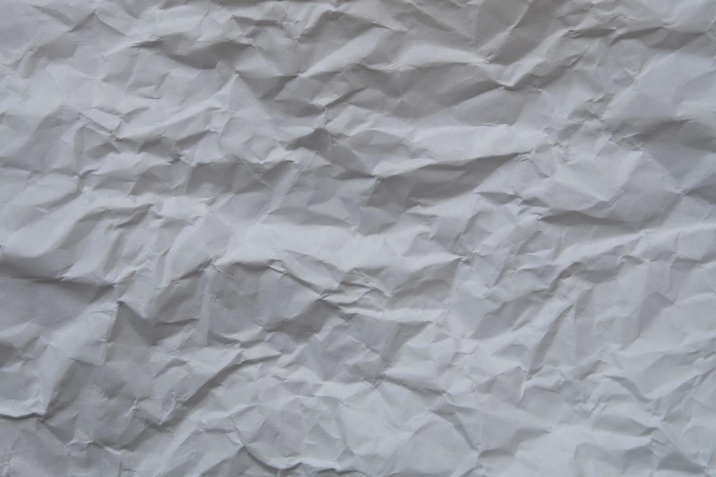 Top view of crumpled paper texture background photo