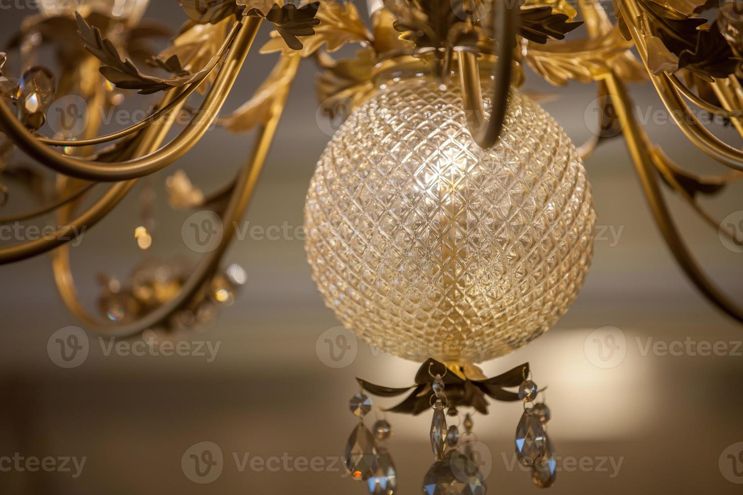 Golden chandelier ball photo