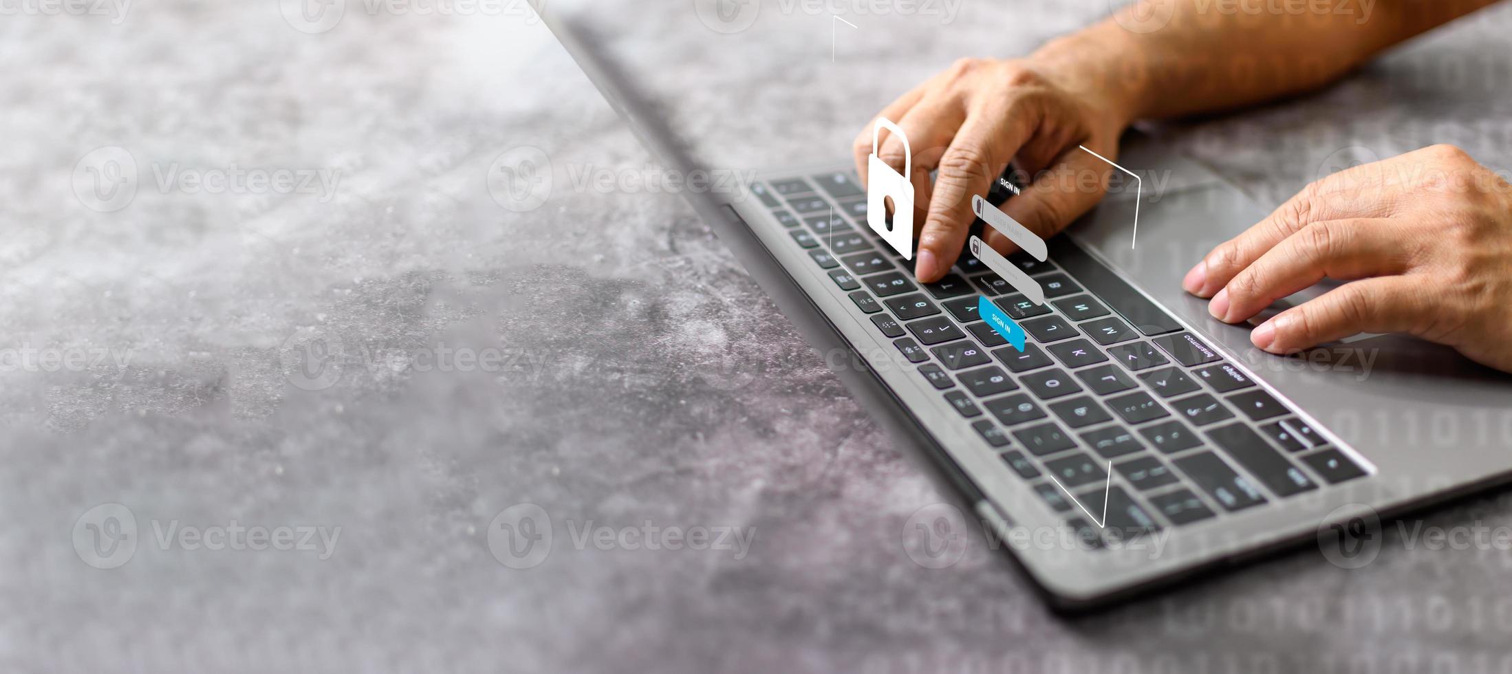 Men typing on keyboard to sign in computer network. Laptop screen showing login for security system. Concept work at home with computers and Internet. Notebook computer on white table. blur background photo