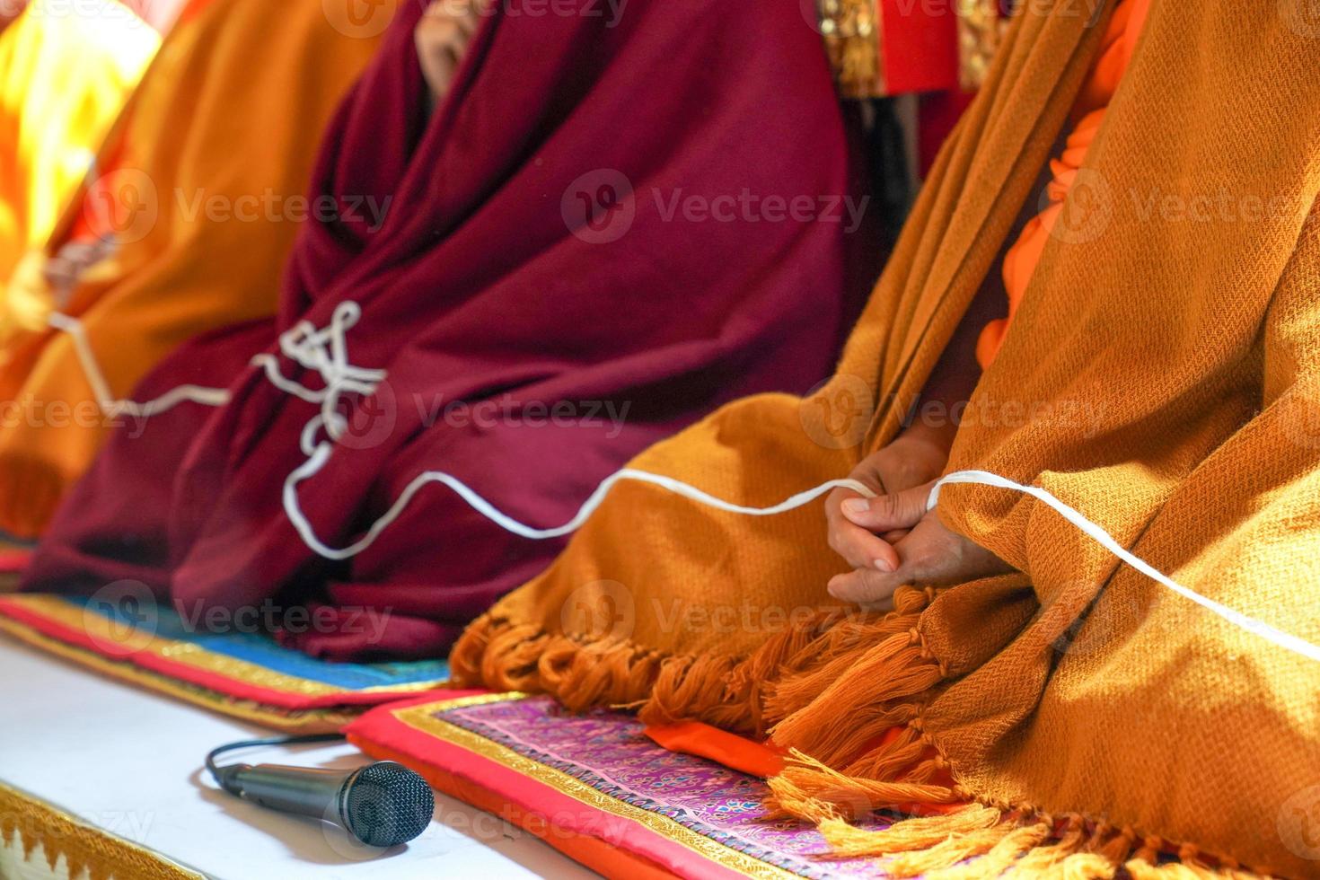 holy thread in monk hands photo