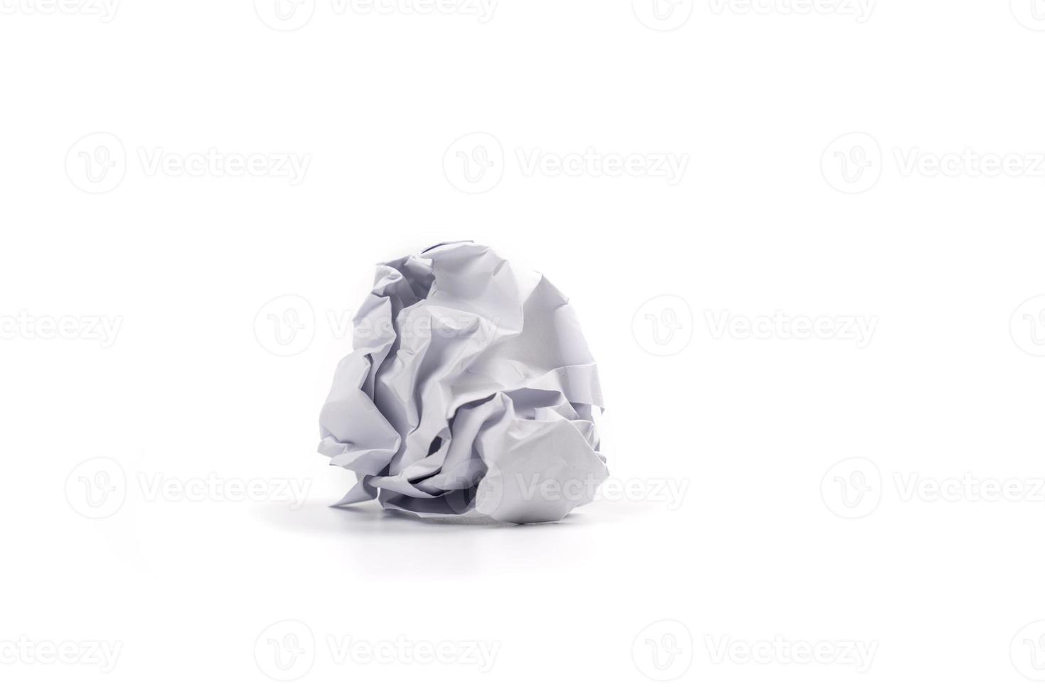 Crumpled white a4 paper was shot in studio light on white background. This means no idea or fail plan concept. Clipping path. photo