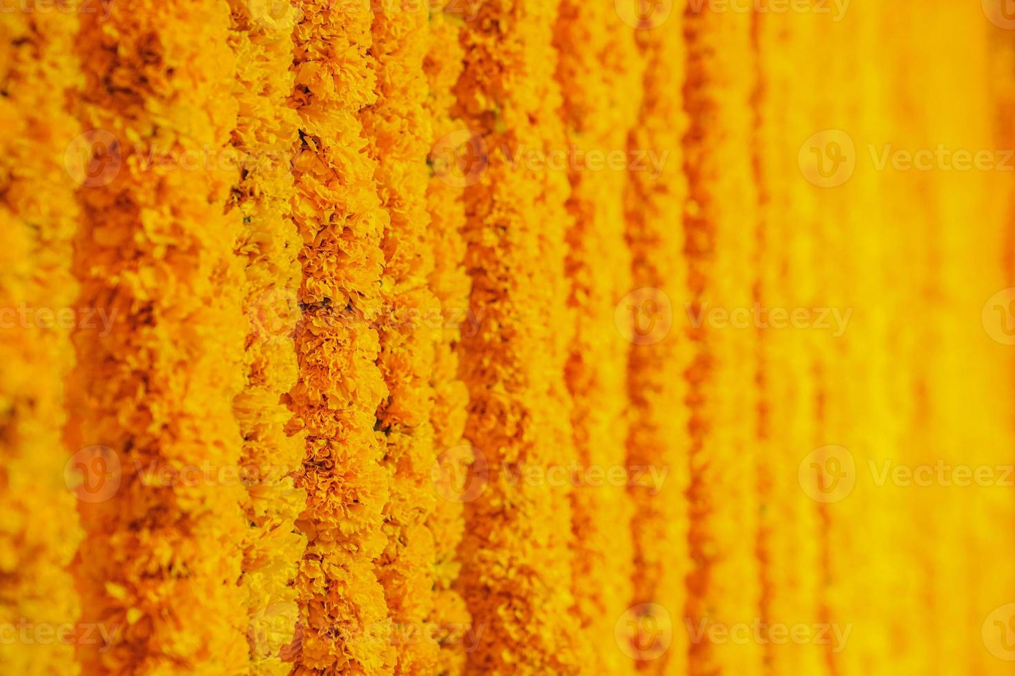 Marigold arrangement to flower steering and mobile to decorate event  festival for photo shooting or backdrop and background in Flower Market, Thailand.