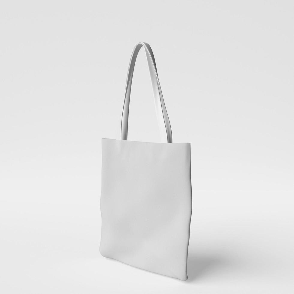 blank white fabric canvas bag for shopping isolated photo